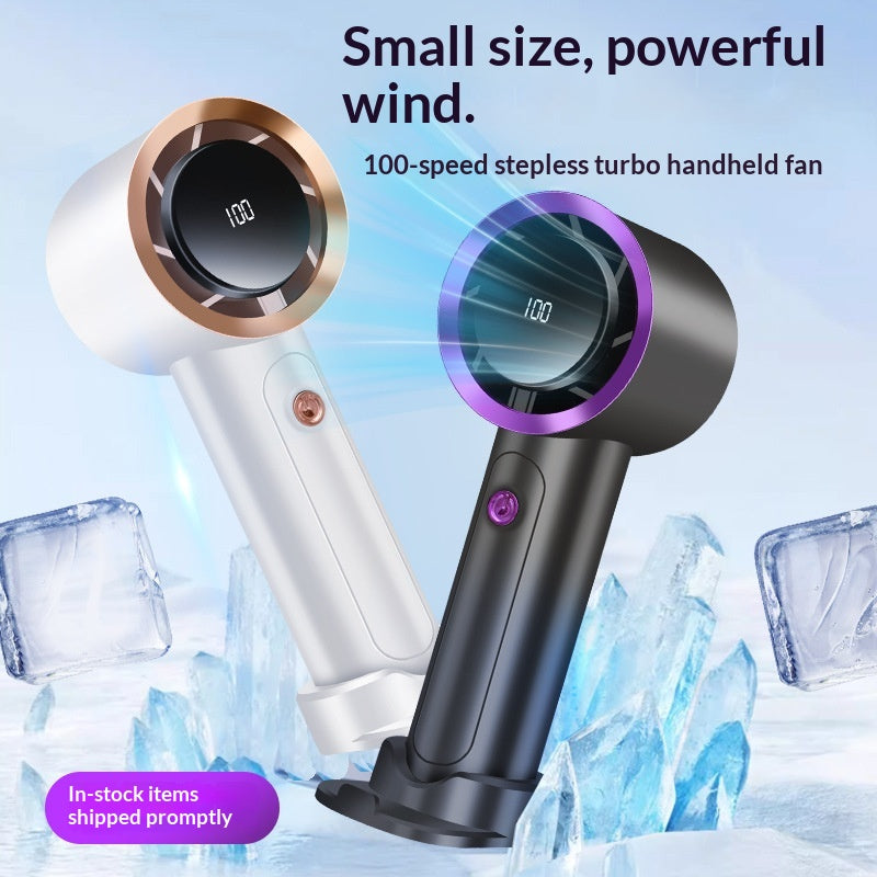 Breeze To-Go handheld cooling fan, in use