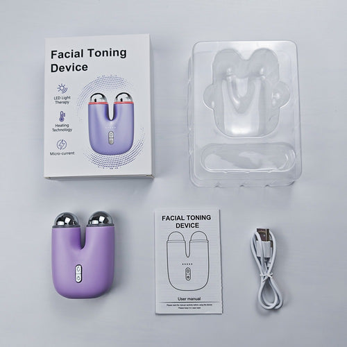 Glow Ritual V-Face LED light therapy massager, in use on face